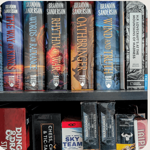 A bookshelf with fantasy novels.